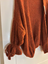 Cardigan with frill sleeve and tie